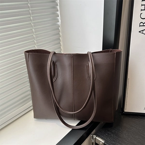 Large dark brown PU leather tote bag with vertical stitching and slim shoulder straps