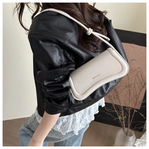 Chic cream-white leather underarm bag with a distinctive textured edge and gold logo detail