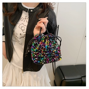Close-up of vibrant multi-color sequins and drawstring closure on bucket bag