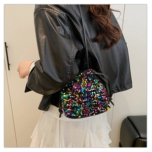 Detailed close-up of vibrant multi-colored sequins and drawstring closure on the bucket bag