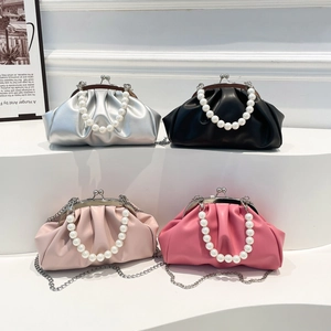 Gathered pearl handle crossbody bags in silver, black, and pink with metal chain straps