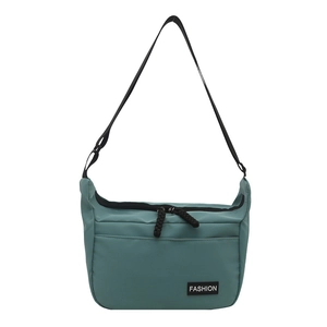 Modern turquoise messenger bag with adjustable strap and fashion label for daily use