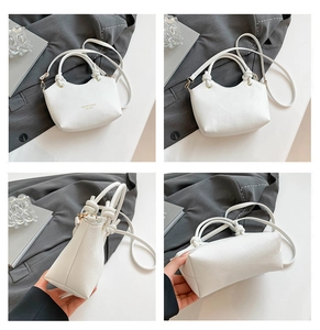 Detailed views of a white lychee grain bucket bag with knotted handles and a gold logo