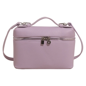 Lavender lychee textured leather box handbag with silver zipper and detachable strap