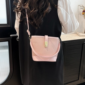Pink patchwork bucket bag with woven PU leather and adjustable strap for women