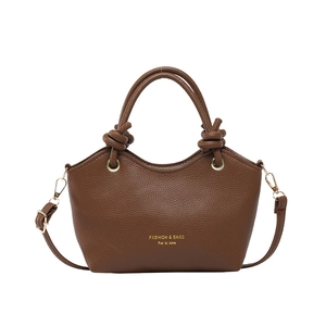 Brown litchi leather bucket bag with top handles and detachable shoulder strap