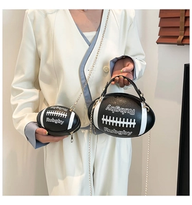 Rugby shaped handbag set with black and white leather texture and gold metal chain strap