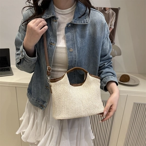 Chic two-tone contrast woven bucket bag with brown leather trim for casual style
