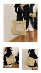 Detail view of large straw tote bag with brown leather pocket and woven rope handles