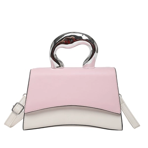 Pink and white trapezoid handbag with silver U-shaped handle and adjustable strap