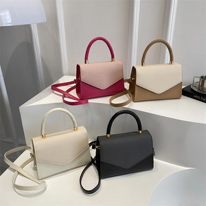 Minimalist square handbags in four colors with quilted design and gold metal hardware