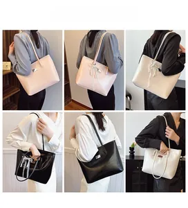Vues multiples de grands sacs cabas en rose, beige et noir avec pendentifs nœuds fins