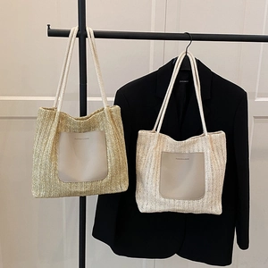 Large woven tote bag for women in khaki and white featuring a front leather pocket patch