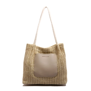 Summer straw woven shoulder tote bag with khaki leather pocket and rope handles