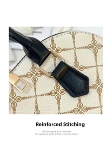 Detail of white vintage crossbody bag with reinforced stitching and golden metal hardware