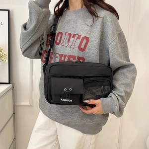 Unisex black nylon crossbody bag with multi-pocket design and transparent window pocket