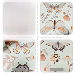 Detailed close-up of luminous butterfly wall sticker showing print texture and adhesive back