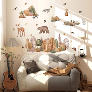 Forest animals wall decal set with watercolor bears and deer in a cozy living room scene
