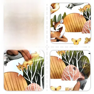 Detail view of watercolor forest animals wall stickers showing translucent texture and reverse side