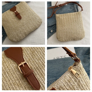 Close-up of beige woven straw crossbody bag with brown leather strap and gold buckle