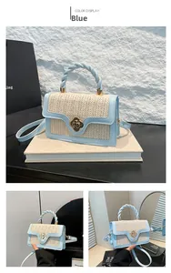 Close-up of light blue leather strap and straw weave texture on a mini square handbag