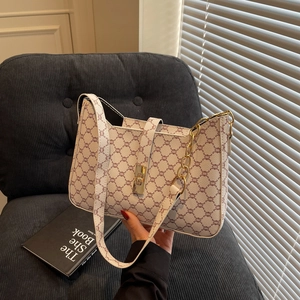 Borsa sottobraccio vintage minimalista con catena dorata e chiusura a girello per donna