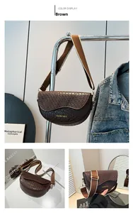 Detail of woven texture on brown saddle bag with adjustable wide shoulder strap
