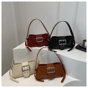Group display of crocodile texture baguette bags with silver metal buckles in four colors