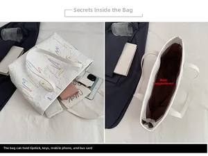 Vue macro de l'intérieur du grand sac cabas et détails de broderie rayée
