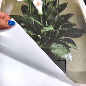 Detail of adhesive white lily wall sticker showing no-white-edge cutting and PVC material