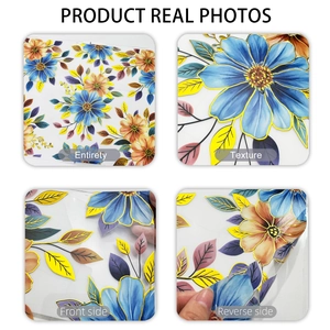 Detail of floral window decals showing golden edges and vibrant petal textures
