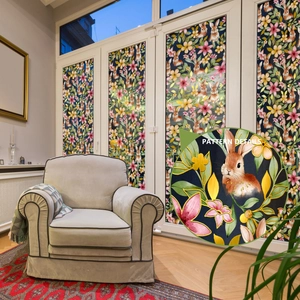 Detail showing floral rabbit patterns on frosted privacy window film for glass doors