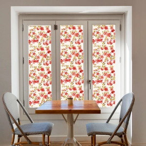 Floral window static film with red and yellow blossoms on white wooden window frames