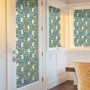 Detailed view of floral rabbit static window film on glass door and bedroom windows