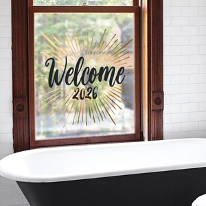Detail of creative fireworks decal with Welcome 2026 text on glass window decor