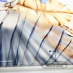 Macro detail of translucent frosted plant wall sticker with adhesive backing and blue palm leaf