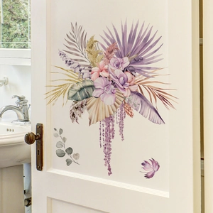 Detail of bohemian floral wall stickers with watercolor dried flowers on a white door