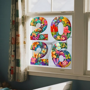 Close-up of 2026 floral static window sticker with butterflies on glass surface