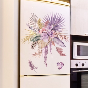 Detail of bohemian floral wall stickers featuring purple orchids on a fridge surface