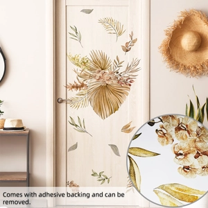 Detail showing self-adhesive boho botanical wall stickers on a light wooden door surface