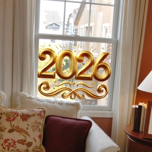 Close-up of golden 3D metallic 2026 window stickers in a cozy living room setting