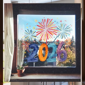 Festive 2026 New Year window clings with colorful fireworks on home glass pane