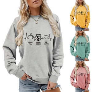 Detail showing soft knit sweatshirt texture and slogan print in multiple colors