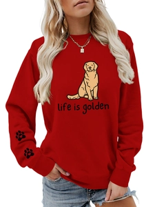 Close-up of red sweatshirt sleeve featuring two cute paw prints with heart details