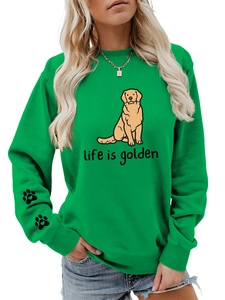 Detail of the golden retriever print and life is golden text on the green sweatshirt