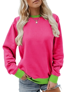 Detail of color-block crewneck sweatshirt with ribbed cuffs and soft cotton texture