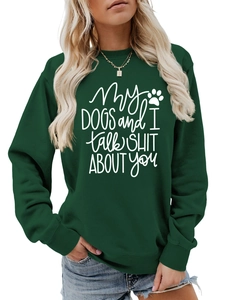 Detail of dark green crewneck sweatshirt with My dogs and I talk shit about you white print