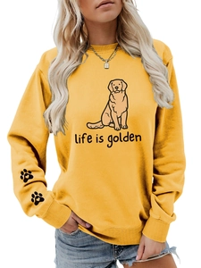 Detail of life is golden text and golden retriever print on yellow crewneck sweatshirt