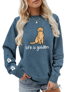 Detail view of dog paw heart prints on sleeve of navy life is golden sweatshirt