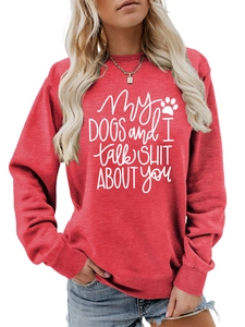 Detail of red crewneck sweatshirt with My Dogs and I talk Shit text print on the front